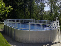 Oval above ground swimming pool.