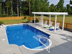 Thursday Pools custom in ground fiberglass swimming pool sold and installed by Waide’s Pools in Erie, PA.