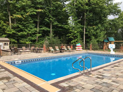 Waide’s Pools and Spas experts installed this custom in ground pool to enhance the existing customer landscaping.