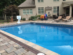 Shown: Large Rectangular in ground pool with crystal clear water and pool lounges.